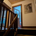 Flowers on table overlooking ocean sunset